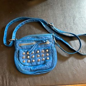 Charming Charlie mini crossbody purse with metal stud detail